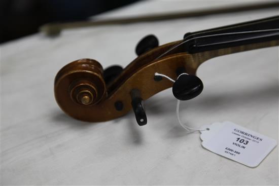 A late 19th / early 20th violin, length of back 14in., together with case and bow